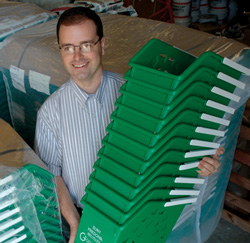 Kevin Kloos with Go Green recycling bins